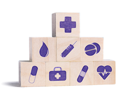 Wooden blocks with healthcare related symbols